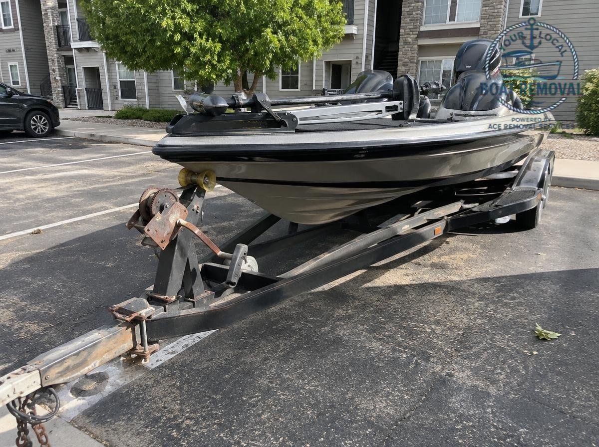 Ranger 519VX bass boat at a apartment complex parking lot in Greeley, CO, before removal